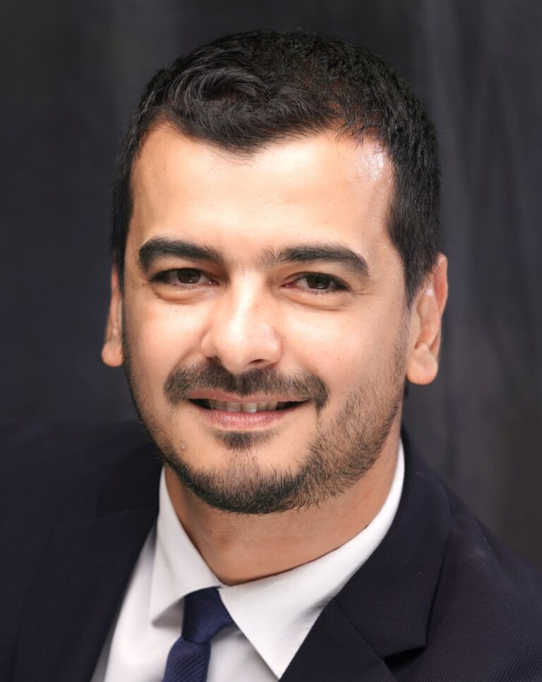 Professional headshot of Huthaifa Ismail, trading educator and founder of Build Ur Wealth.